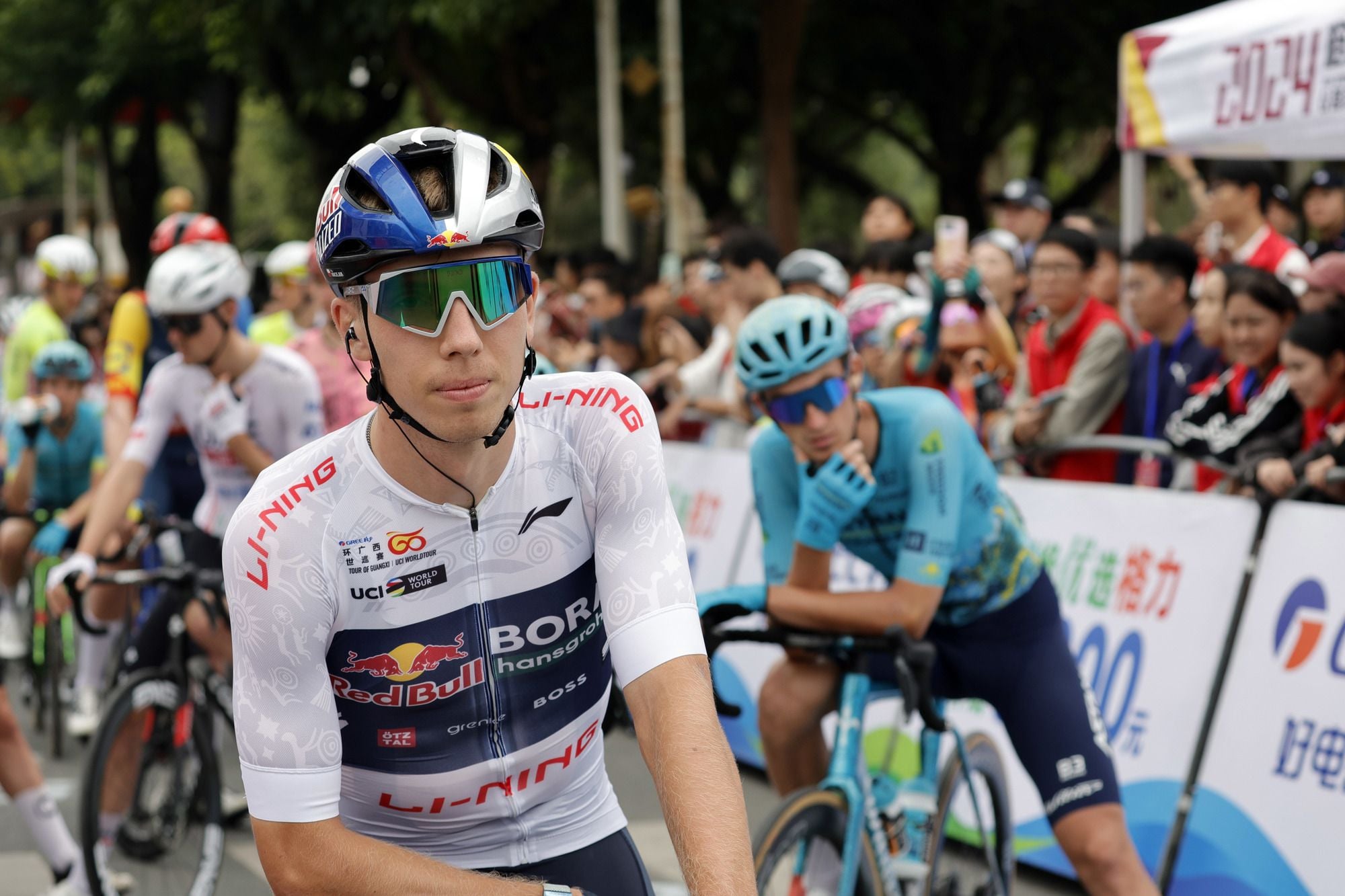 Filip Maciejuk in the white jersey at the start of the third stage of this year's Tour of Guangxi. (Photo: Sprint Cycling Agency)